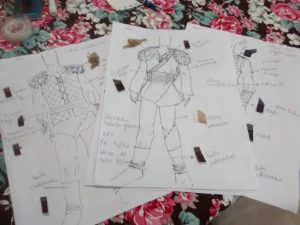 tres desenho sobre a mesa de croqui de figurino viking